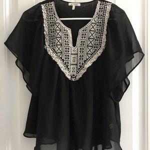 Francesca’s shirt